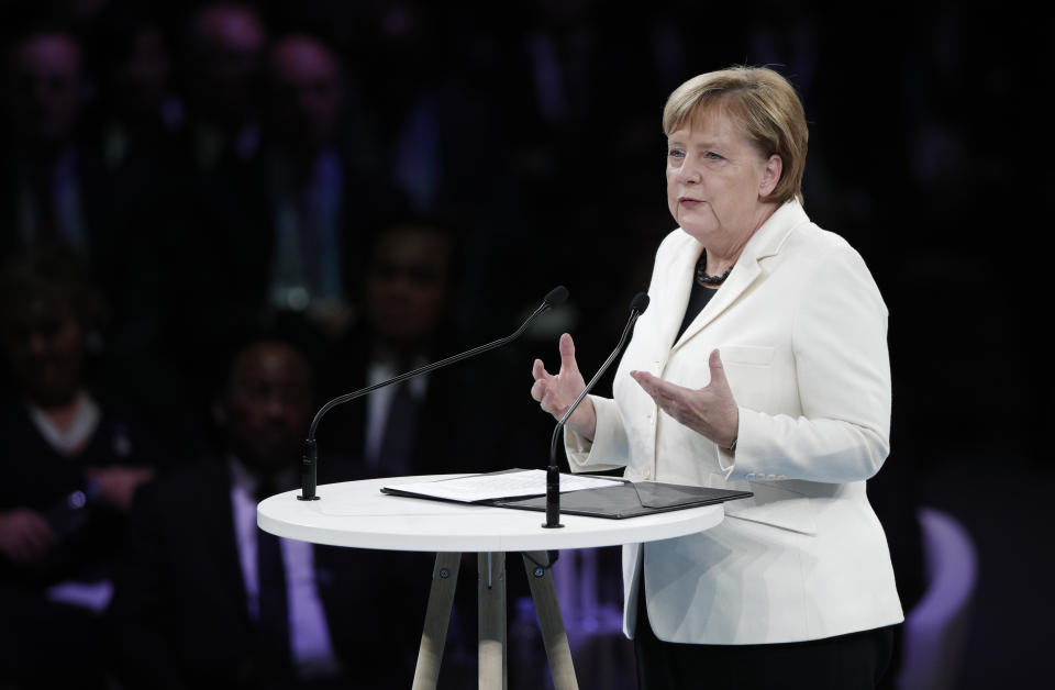 German Chancellor Angela Merkel speaks at the opening session of the Paris Peace Forum as part of the commemoration ceremony for Armistice Day, in Paris, Sunday, Nov. 11, 2018. International leaders attended a ceremony in Paris on Sunday at mark the 100th anniversary of the end of World War I. (Yoan Valat, Pool via AP)