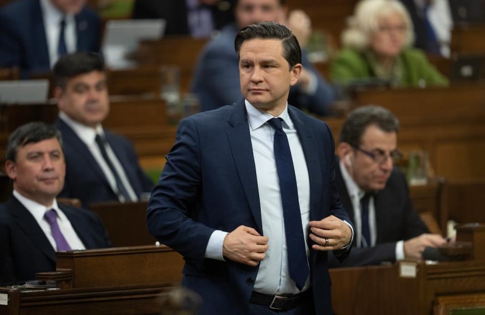 Conservative Leader Pierre Poilievre rises to vote on a motion during a session expected to go through the night in the House of Commons, Friday, December 8, 2023 in Ottawa.  