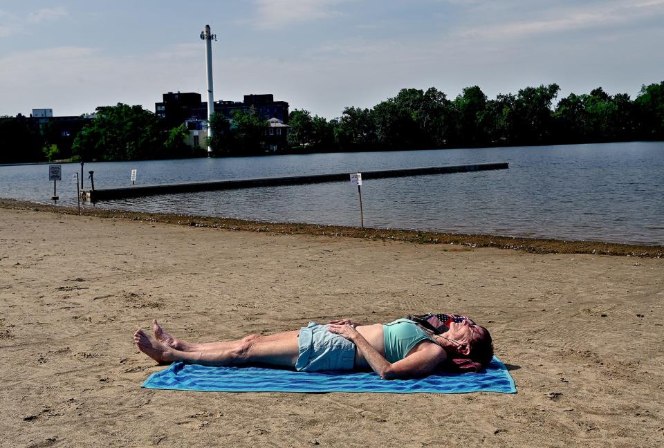 Robyn Ross of Framingham had Framingham's Learned Pond Beach to herself on Aug. 12, 2021.