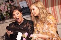 Kris Jenner and Dee Hilfiger admire the new merchandise at Dee’s dinner with husband Tommy Hilfiger to celebrate her brand, Dee Ocleppo, at the San Vicente Bungalows in West Hollywood on Thursday.