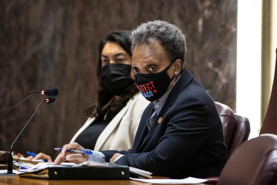 Chicago Mayor Lori Lightfoot presides over the Chicago City Council meeting at City Hall, Wednesday morning, April 21, 2021. Wednesday marked the first in-person council meeting since the start of the coronavirus pandemic more than a year ago.