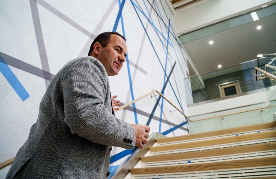 Republic Airways Chief Administrative Officer and Executive Vice President Matt Koscal makes his way up a set of stairs Friday, Feb. 17, 2023, inside the company's new training center in Carmel. 