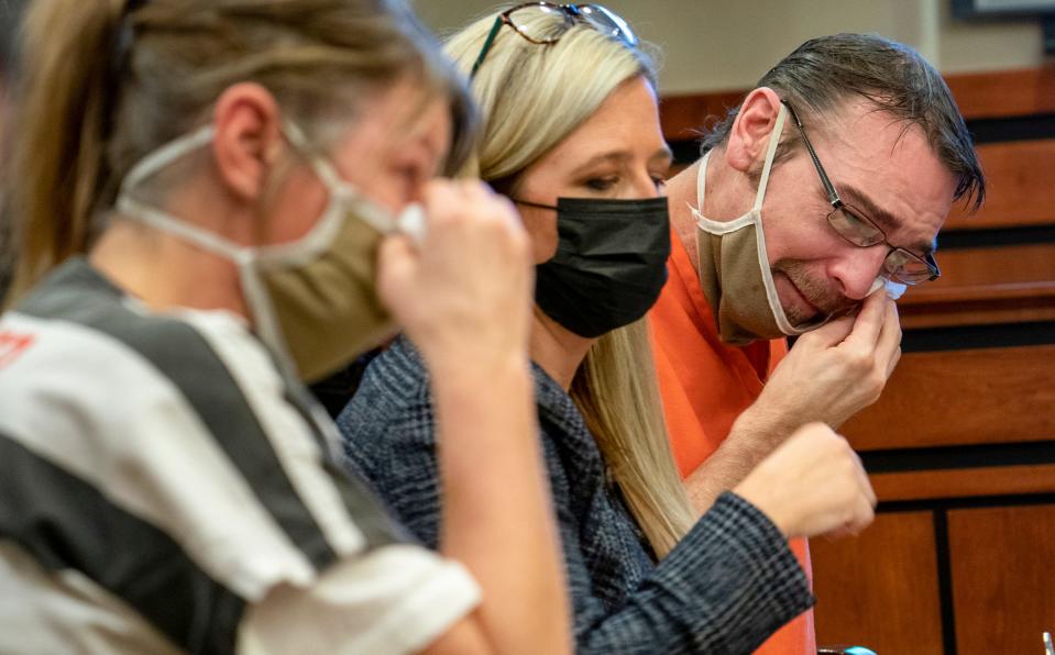 Jennifer and James Crumbley, parents of Ethan Crumbley who is accused of the deadly school shooting at Oxford High School in late November, break down into tears in the courtroom during a hearing on Thursday, Feb.24, 2022.