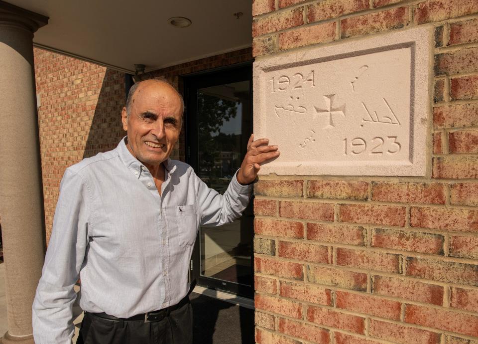 Church member George Hanna shows the cornerstone of St. Mary’s Syriac Orthodox Church of Shrewsbury. The stone was first laid at the original church on Hawley Street in Worcester in 1923 and moved with the congregation to Shrewsbury.