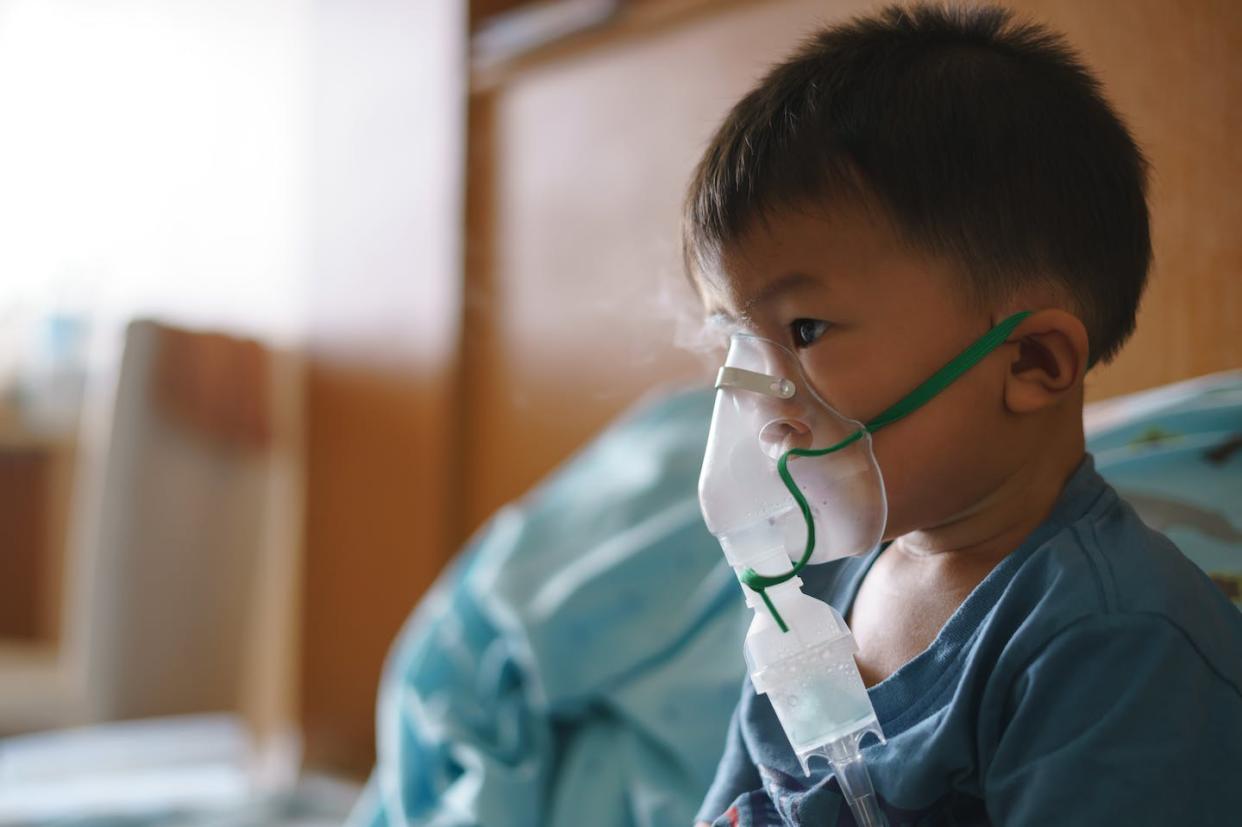 Only one antiviral medication is approved by the FDA for RSV treatment, and it is administered through a nebulizer. <a href="https://www.gettyimages.com/detail/photo/asian-boy-using-inhaler-containing-medicine-to-stop-royalty-free-image/1227487354?phrase=RSV&adppopup=true" rel="nofollow noopener" target="_blank" data-ylk="slk:BonNontawat/iStock via Getty Images Plus;elm:context_link;itc:0;sec:content-canvas" class="link ">BonNontawat/iStock via Getty Images Plus</a>