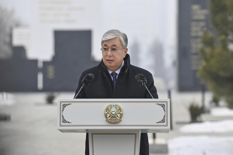 FILE - In this photo released by Kazakhstan's Presidential Press Service, Kazakhstan's President Kassym-Jomart Tokayev speaks during an unveiling a memorial to the hundreds of people killed amid the worst unrest in Kazakhstan's three decades of independence in January of 2022 in Republic Square, in the heart of the country's former capital Almaty, Kazakhstan, Friday, Dec. 23, 2022. Wisps of fog hung over central Almaty, Kazakhstan, last month as President Kassym-Jomart Tokayev somberly unveiled a monument to those killed a year ago in a wave of unrest that was the worst in the Central Asian nation's three decades of independence. (Kazakhstan's Presidential Press Service via AP, File)