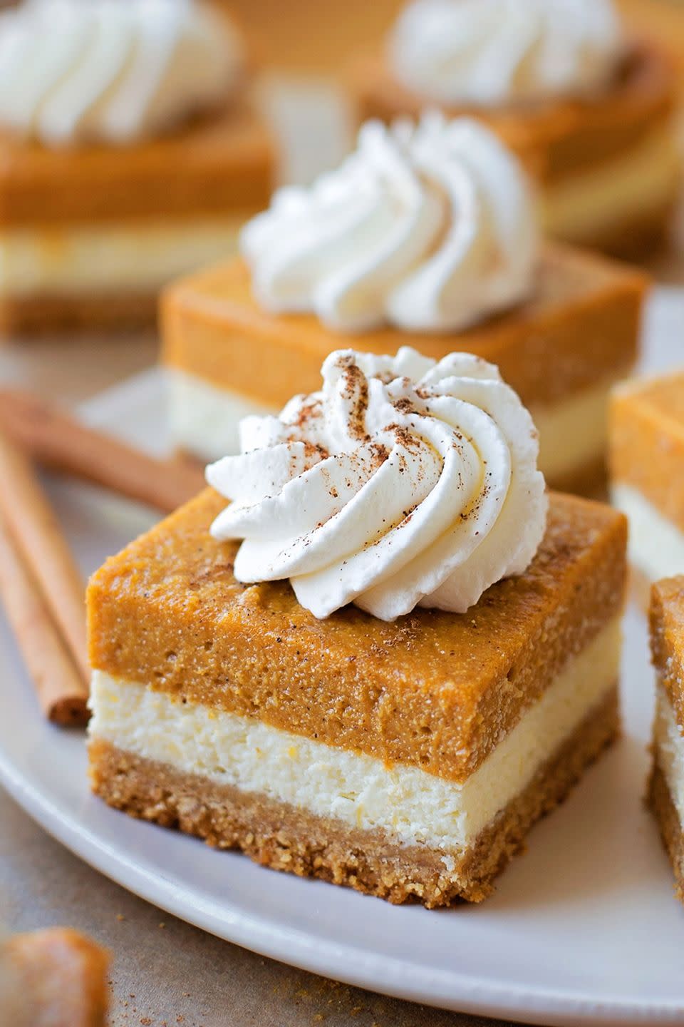 <p>Tired of pumpkin pie? Whip up these three-layer bars that boast a graham cracker crust, cheesecake center, and pumpkin topping.</p><p><strong>Get the recipe at <a href="https://lilluna.com/pumpkin-pie-cheesecake-bars/#_a5y_p=5821427" rel="nofollow noopener" target="_blank" data-ylk="slk:Lil' Luna;elm:context_link;itc:0;sec:content-canvas" class="link ">Lil' Luna</a>.</strong></p>