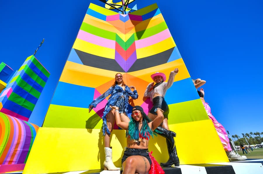 Festivalgoers enjoy “Monarchs: A House in six parts” from artist Hannah during the Coachella Valley Music and Arts Festival in Indio, California, on April 14, 2024. (Photo by VALERIE MACON / AFP) / RESTRICTED TO EDITORIAL USE – MANDATORY MENTION OF THE ARTIST UPON PUBLICATION – TO ILLUSTRATE THE EVENT AS SPECIFIED IN THE CAPTION (Photo by VALERIE MACON/AFP via Getty Images)