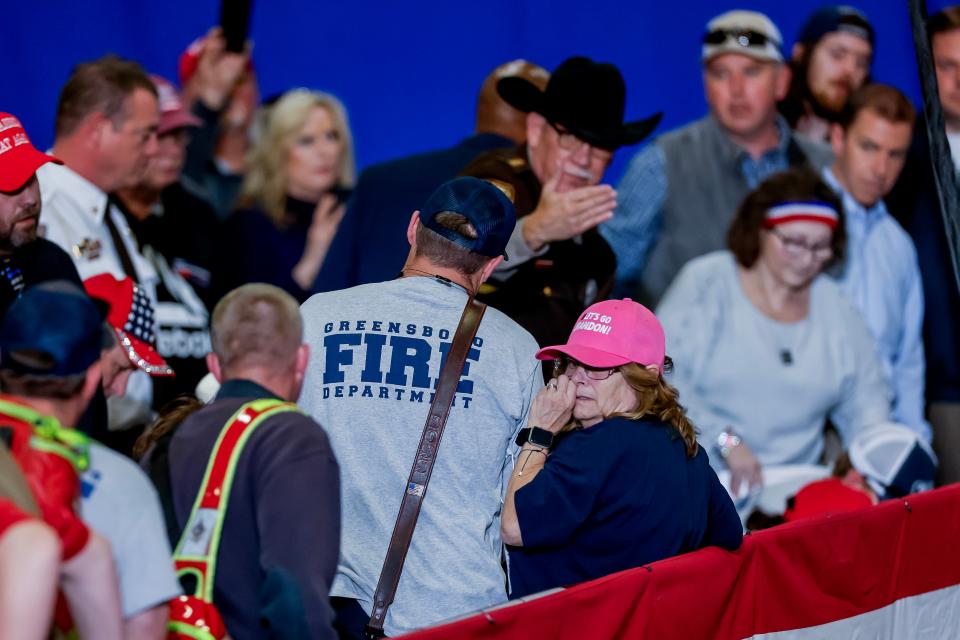Emergency personnel respond as an attendee falls ill as former US President and Republican presidential candidate Donald Trump participates in a ‘Get Out The Vote Rally’ campaign event at the Greensboro Coliseum Complex in Greensboro, North Carolina (EPA)