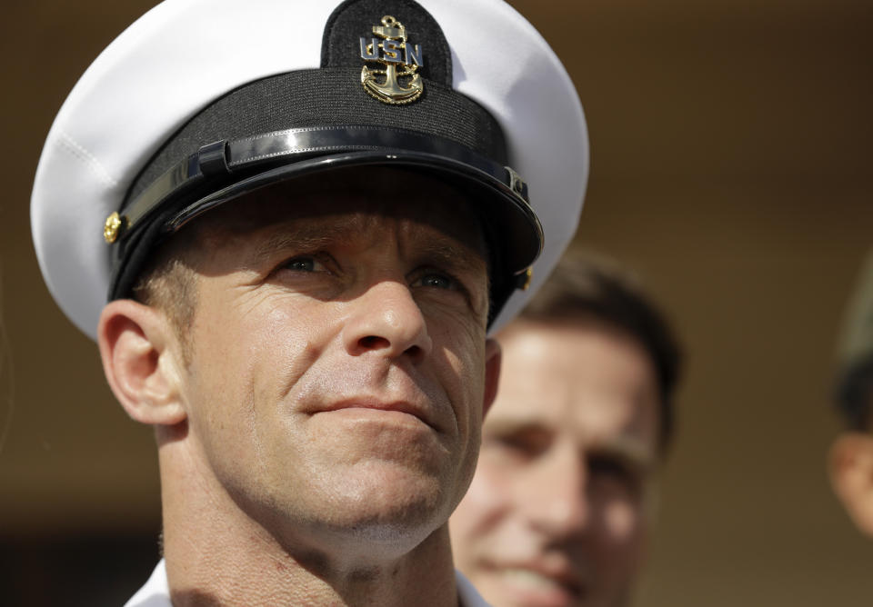 FILE - In this Tuesday, July 2, 2019, file photo, Navy Special Operations Chief Edward Gallagher leaves a military court on Naval Base San Diego in San Diego Navy Special Operations Chief Edward Gallaghe has sued two of his former attorneys and a military legal defense nonprofit. The San Diego Union-Tribune says the lawsuit filed Friday, Sept. 13, 2019, in Texas by Petty Officer 1st Class Edward Gallagher claims his case was not defended properly. The filing says attorneys Colby Vokey and Phillip Stackhouse, along with United American Patriots, attempted to delay the case in an effort to maximize fundraising for the nonprofit. (AP Photo/Gregory Bull, File)