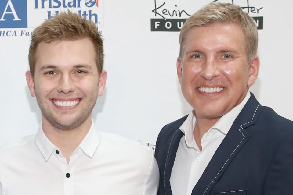 Terry Wyatt/Getty Images Chase Chrisley and Todd Chrisley