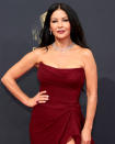 <p>Catherine Zeta-Jones knows a thing or two about how to make an entrance on the red carpet, and she certainly didn't pipe down for this year's Emmys. Her smoky eye makeup and red wine lip was created using products from her beauty line <a href="https://www.wunder2.com/collections/casa-zeta-jones" rel="sponsored noopener" target="_blank" data-ylk="slk:Casa Zeta-Jones;elm:context_link;itc:0;sec:content-canvas" class="link ">Casa Zeta-Jones</a>. As for hair, the star added in some soft waves and kept her long locks tucked behind her shoulders. </p>