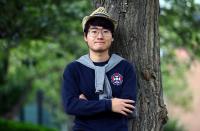 Simon Cheng, a former British Consulate employee, poses for a photograph in London