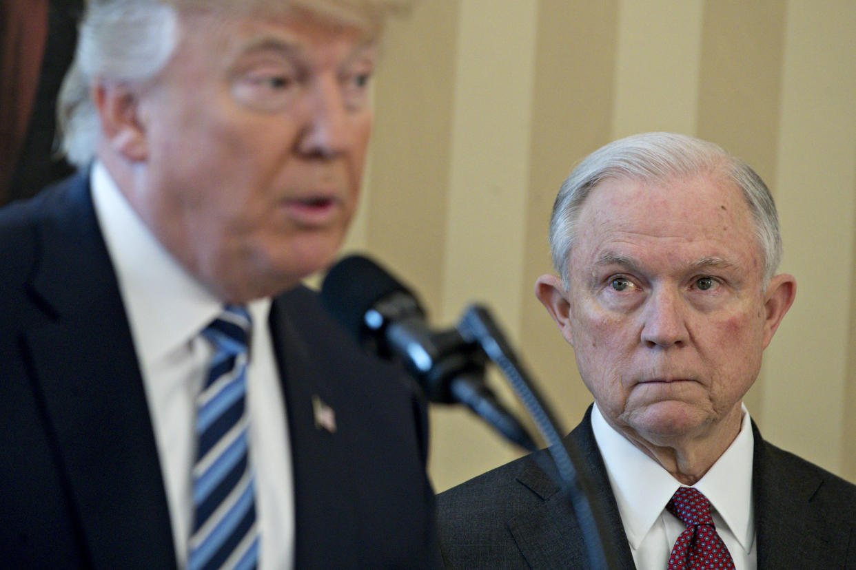 Jeff Sessions listens as President Trump speaks before he is sworn in as attorney general on Feb. 9, 2017. (Photo: Andrew Harrer/Bloomberg via Getty Images
