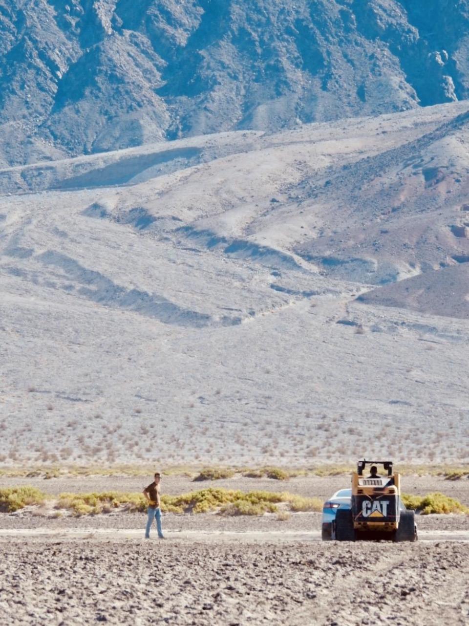 A skid steer was used to carefully extract the car after it got stuck in the mud in Death Valley while traveling across the salt flat. / Credit: National Park Service