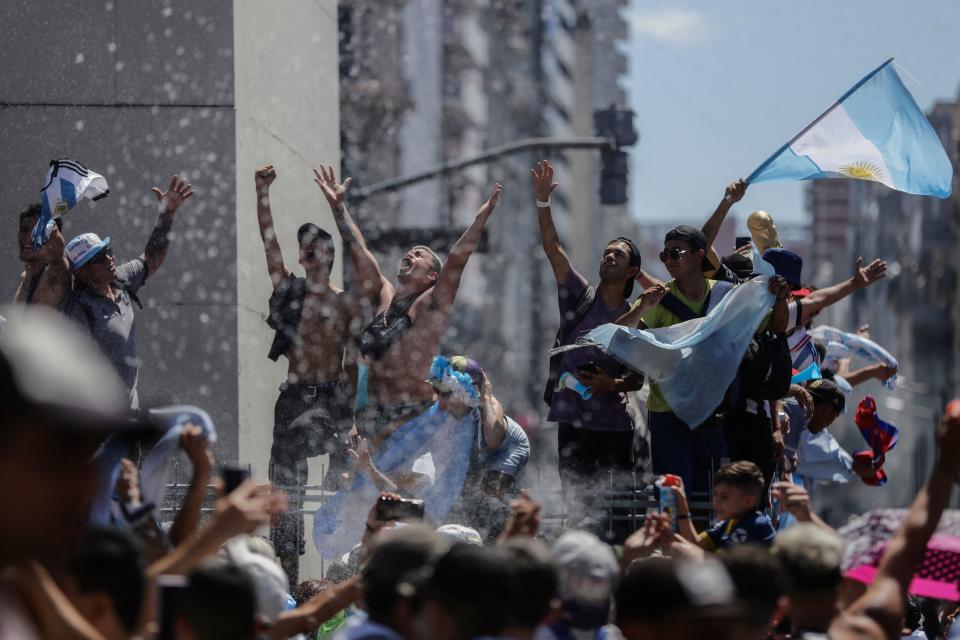 Fans of Argentina gather at the Obelisk to celebrate winning the Qatar 2022 World Cup against France in Buenos Aires, on December 18, 2022. (Photo by Emiliano Lasalvia / AFP) (Photo by EMILIANO LASALVIA/AFP via Getty Images)