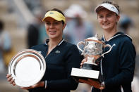 Czech Republic's Barbora Krejcikova, right, and Russia's Anastasia Pavlyuchenkova show their trophies after their final match of the French Open tennis tournament at the Roland Garros stadium Saturday, June 12, 2021 in Paris. The unseeded Czech player defeated Anastasia Pavlyuchenkova 6-1, 2-6, 6-4 in the final. (AP Photo/Thibault Camus)