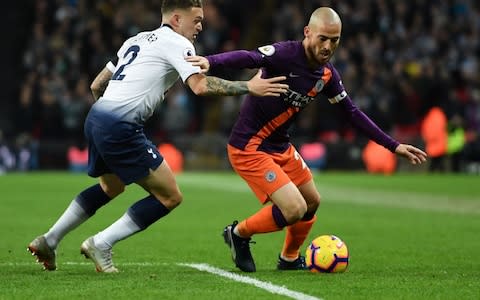 Manchester City's David Silva holds off the challenge from Tottenham Hotspur's Kieran Trippier - Credit: GETTY IMAGES