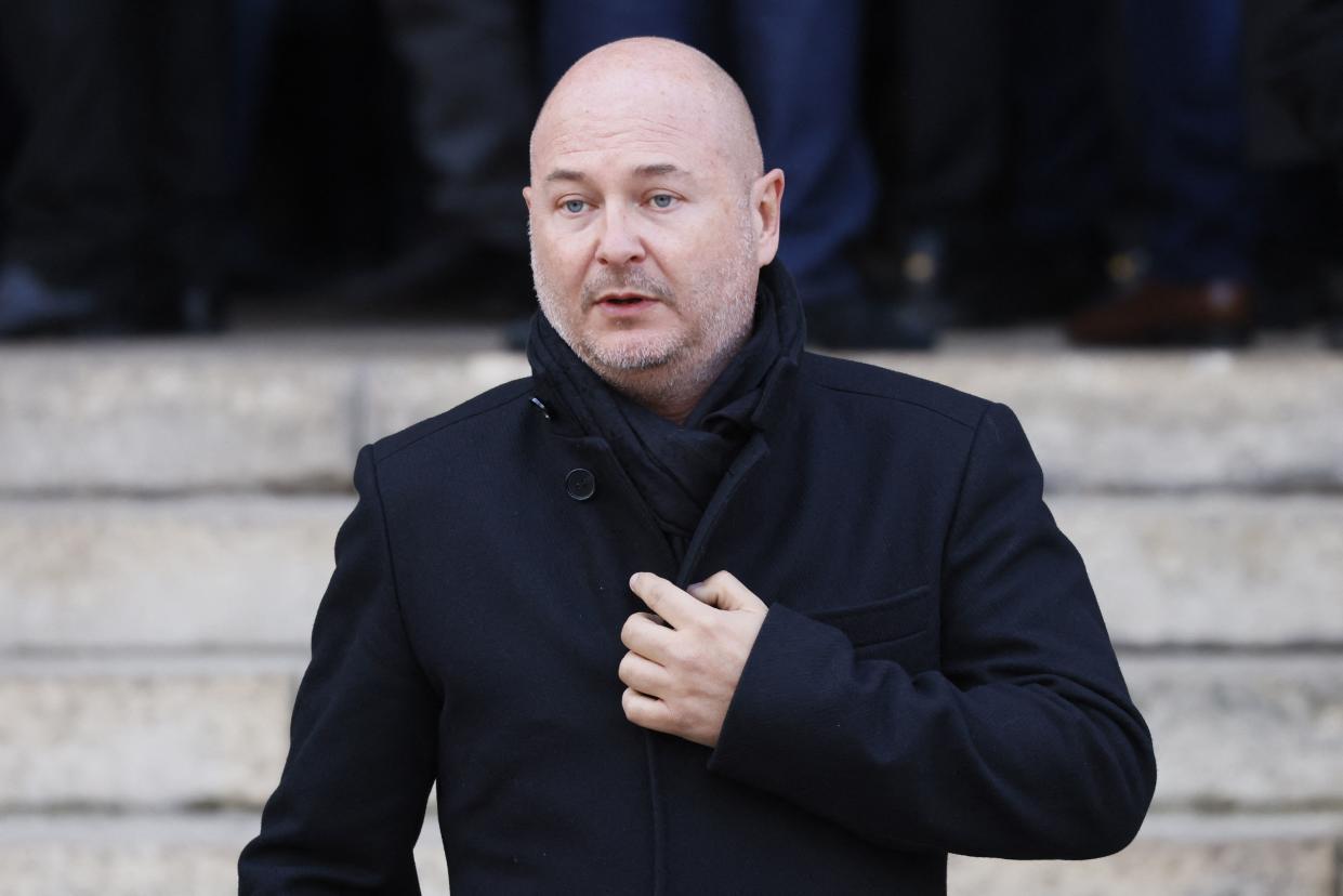 French TV host Sebastien Cauet leaves Sainte-Clothilde basilica following the funeral ceremony of French journalist Jean-Pierre Pernaut in Paris, on March 9, 2022. (Photo by Thomas SAMSON / AFP) (Photo by THOMAS SAMSON/AFP via Getty Images)