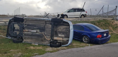 Damaged cars are seen after Super Typhoon Yutu hit Saipan, Northern Mariana Islands, U.S., October 25, 2018 in this image taken from social media. Brad Ruszala via REUTERS