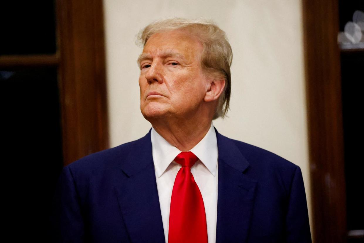 <span>Donald Trump in West Palm Beach, Florida, on Sunday.</span><span>Photograph: Marco Bello/Reuters</span>