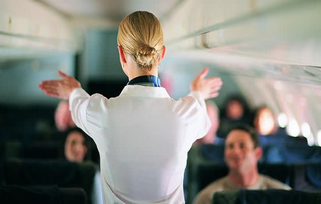 One air hostess says it puts you and others around you in serious danger is you don't watch it. Photo: Getty