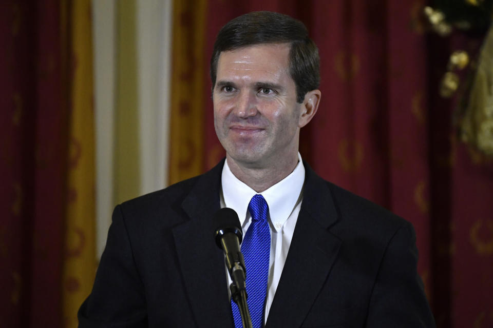 Kentucky Gov. Andy Beshear speaks after being sworn into office, in Frankfort, Ky., early Tuesday, Dec. 10, 2019. (AP Photo/Timothy D. Easley, Pool)