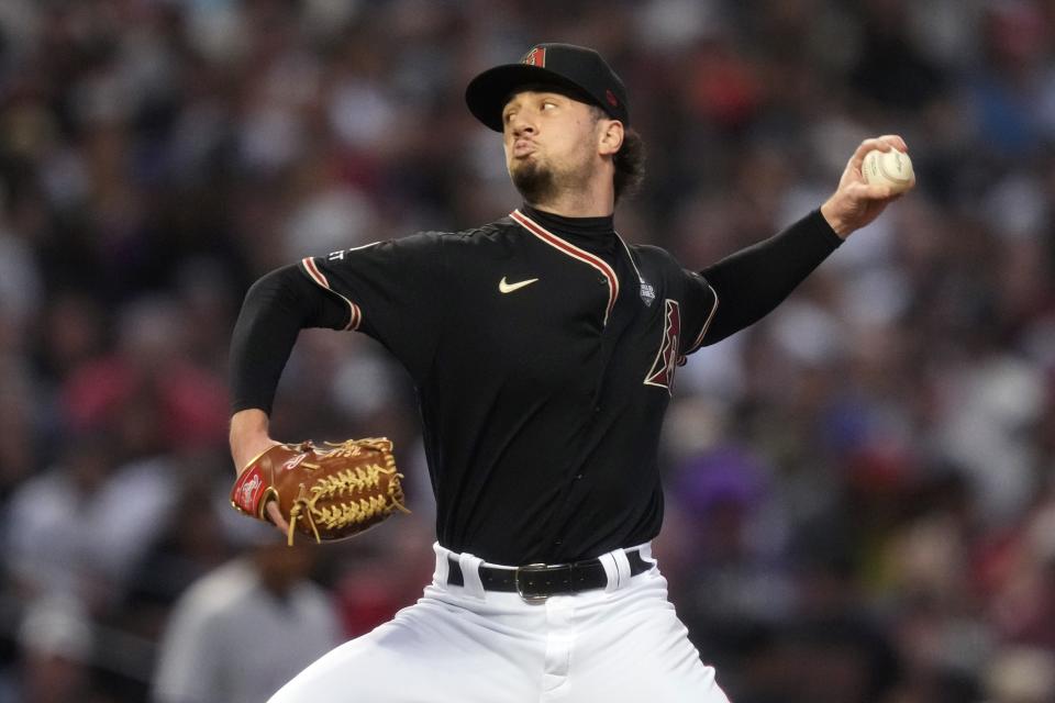 Arizona Diamondbacks relief pitcher Kyle Nelson (24) throws a pitch against the Texas Rangers during the second inning in Game 4 of the 2023 World Series at Chase Field in Phoenix. The DBacks lost to the Rangers 11-7, putting the Rangers at 3-1 in the World Series.