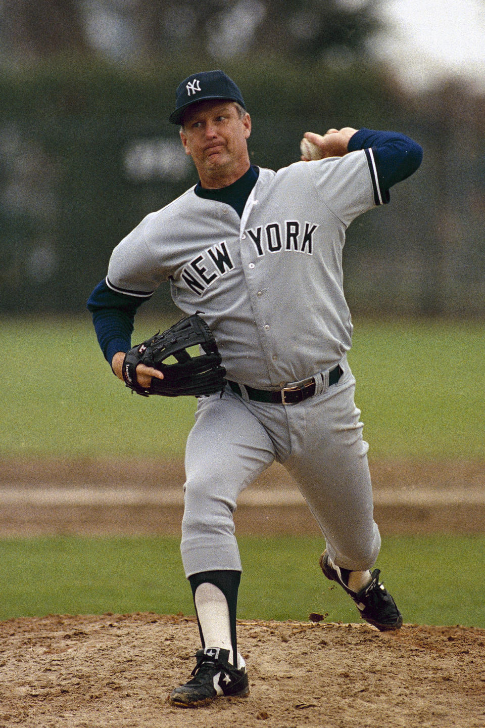 FILE - New York Yankees pitcher Tommy John, 45, throws against the Montreal Expos in West Palm Beach, Fla., March 9, 1985. Tommy John had the first ulnar collateral ligament replacement surgery, a revolutionary operation by Dr. Frank Jobe on Sept. 25, 1974.(AP Photo/Richard Drew, File)