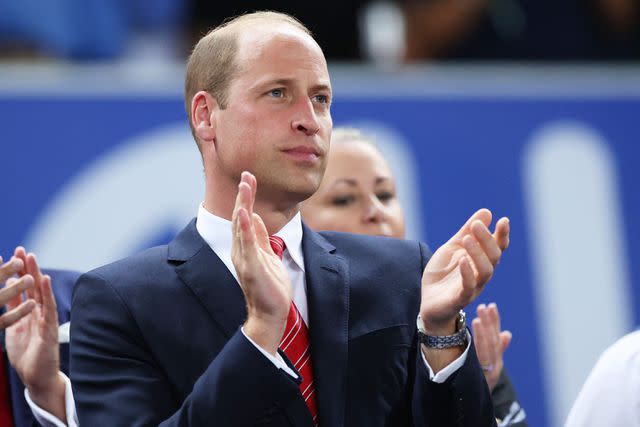 <p>Alex Livesey/Getty</p> Prince William attends the 2023 Rugby World Cup match between Wales and Fiji.