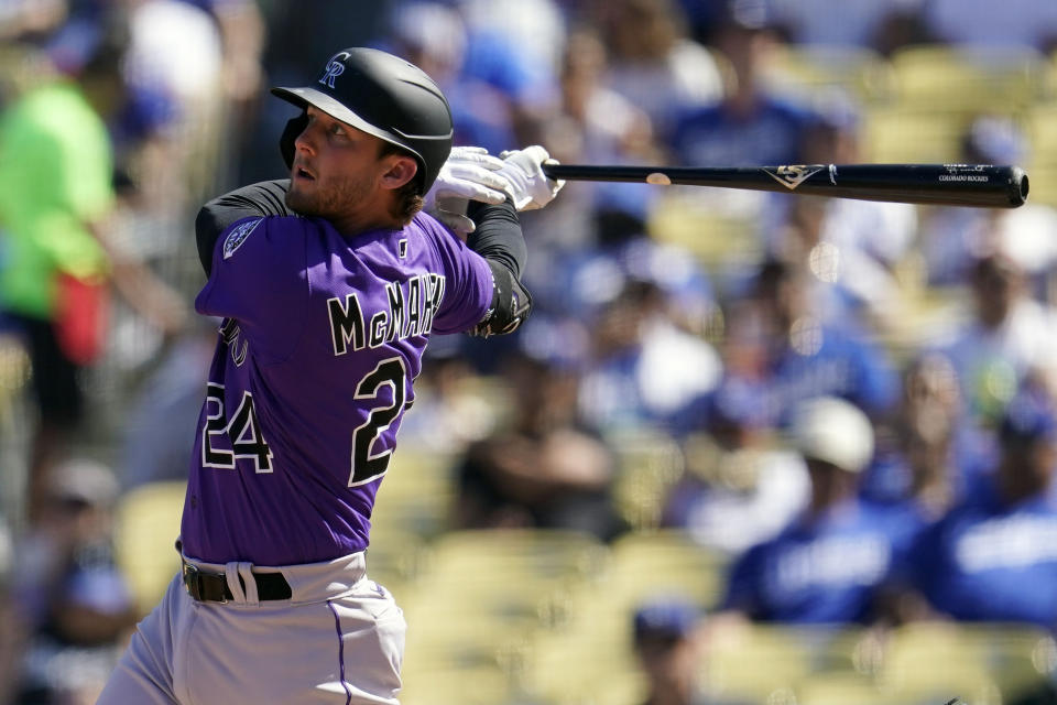 Colorado Rockies' Ryan McMahon watches his RBI-double during the third inning of a baseball game against the Los Angeles Dodgers, Sunday, Oct. 2, 2022, in Los Angeles. (AP Photo/Marcio Jose Sanchez)