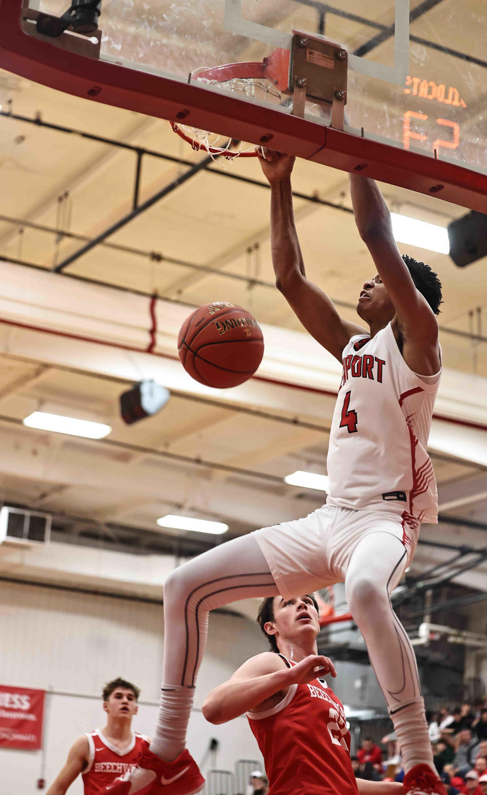 Newport's James Turner (4) dunks during Newport's 81-50 win over Beechwood in the All 'A Classic Tuesday, Jan. 10, 2023.