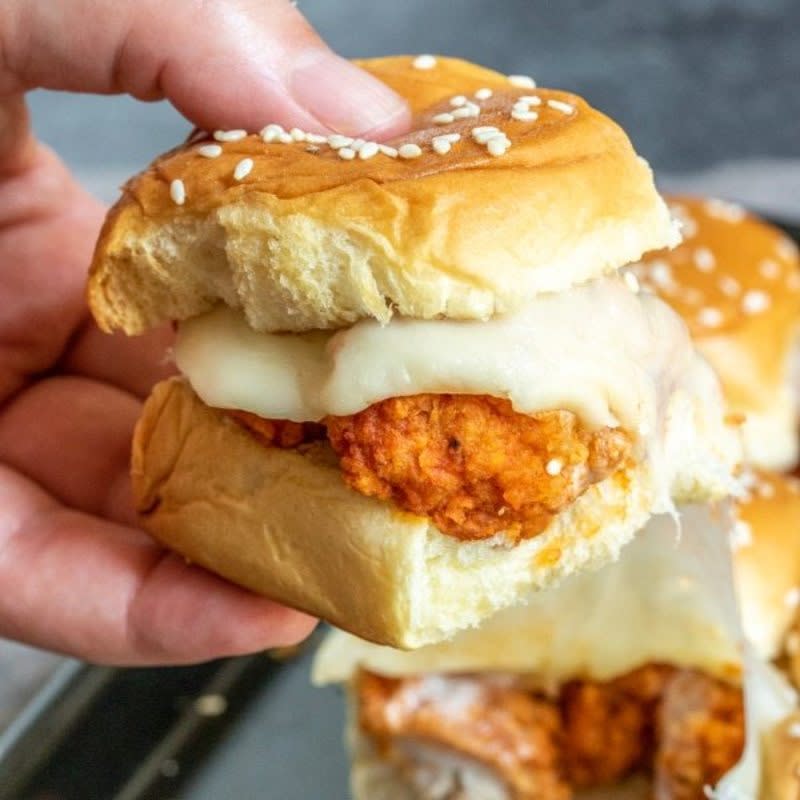 <p>Homemade Interest</p><p>Buffalo chicken sliders made with provolone cheese, ranch dressing and chicken tenders smothered in spicy buffalo wing sauce are the perfect game-day food!</p><p><strong>Get the recipe: <a href="https://www.homemadeinterest.com/ad-buffalo-chicken-sliders-made-tysons-deli-wings/" rel="nofollow noopener" target="_blank" data-ylk="slk:Ham Egg and Cheese Breakfast Sliders;elm:context_link;itc:0;sec:content-canvas" class="link ">Ham Egg and Cheese Breakfast Sliders</a></strong></p>