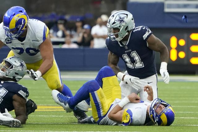 Dallas Cowboys linebacker Micah Parsons (11) is tackled by Los