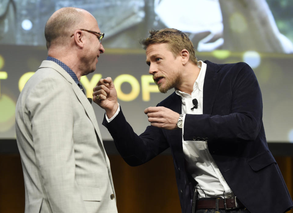 Charlie Hunnam, right, a cast member in the upcoming film "The Lost City of Z," interacts onstage with Bob Berney, head of marketing and distribution for Amazon Studios, during the Amazon Studios presentation at CinemaCon 2017 at Caesars Palace on Thursday, March 30, 2017, in Las Vegas. (Photo by Chris Pizzello/Invision/AP)