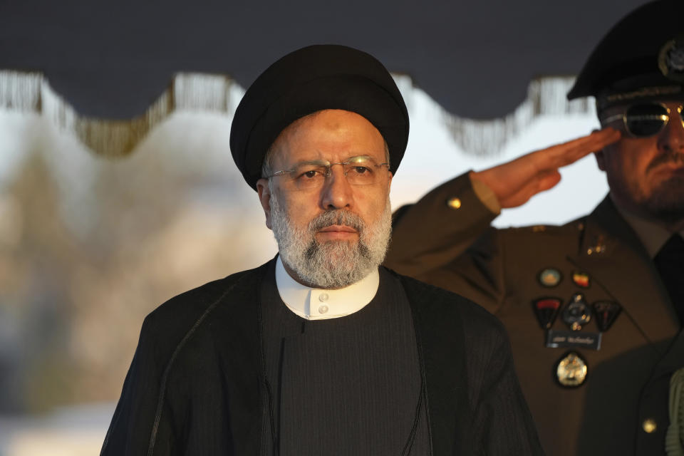 Iranian President Ebrahim Raisi reviews an honor guard during his official departure ceremony as he leaves Tehran's Mehrabad airport to New York to attend annual UN General Assembly meeting, Monday, Sept. 19, 2022. Raisi headed to New York on Monday, where he will be speaking to the U.N. General Assembly later this week, saying that he has no plans to meet with President Joe Biden on the sidelines of the U.N. event. (AP Photo/Vahid Salemi)