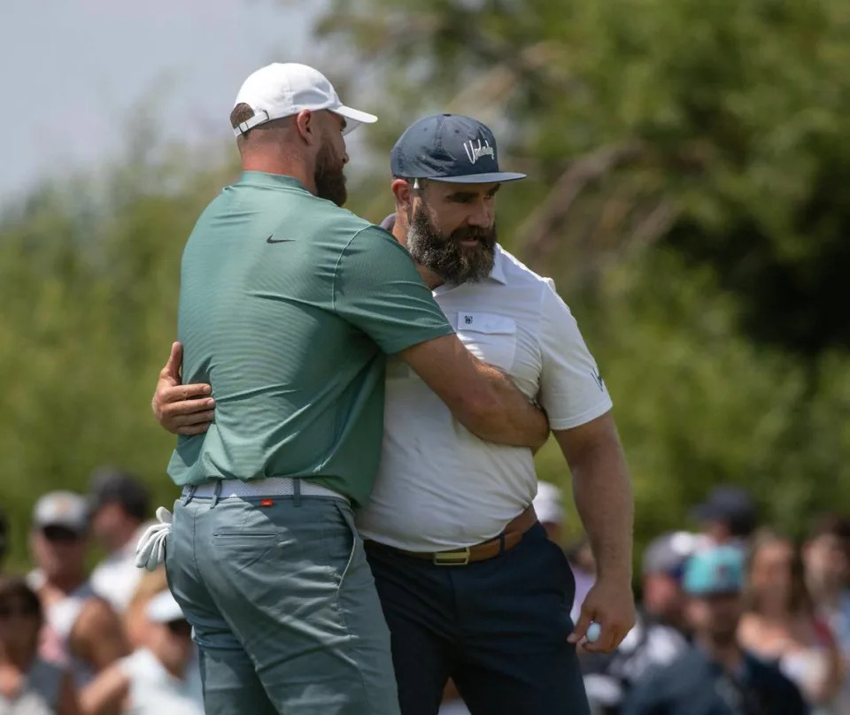 Travis and Jason Kelce embrace following the first round of the American Century celebrity golf championship on Friday, July 12, 2024, in Stateline, Nev.