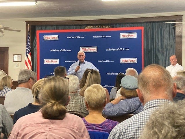 Former Vice President Mike Pence, who is running for the 2024 GOP nomination for president, speaks at a forum in Meredith, N.H., on July 20, 2023.