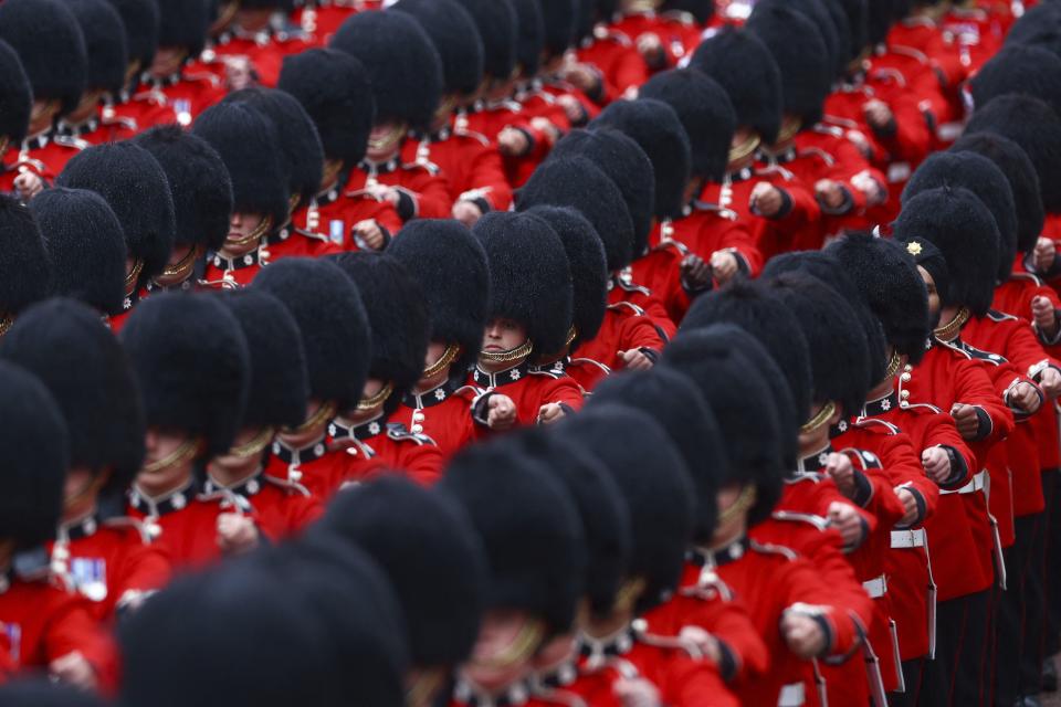 Guards march following the coronation ceremony of Britain’s King Charles and Queen Camilla, along The Mall in London.