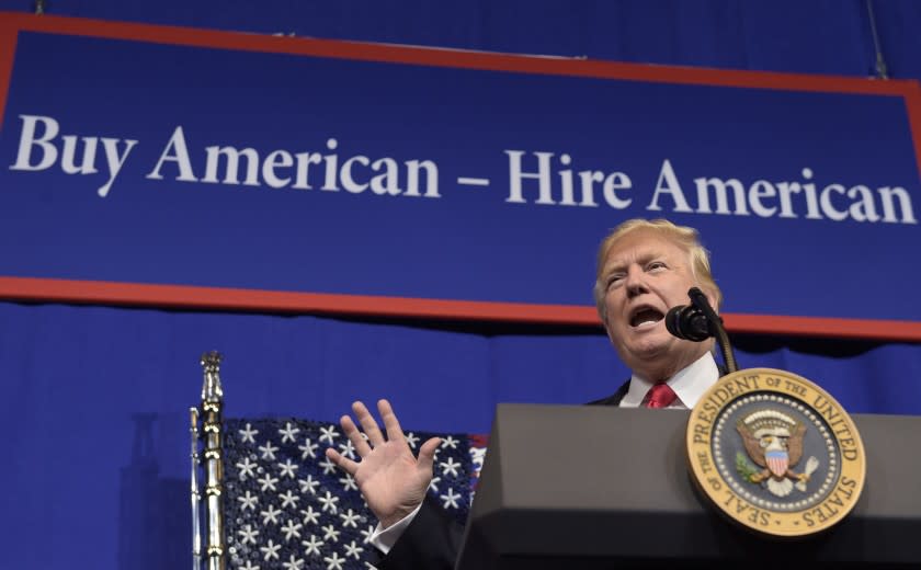 In this Tuesday, April 18, 2017, file photo, President Donald Trump speaks at tool manufacturer Snap-on Inc. in Kenosha, Wis. When Trump signed an executive order Tuesday in Kenosha, he sent a characteristically blunt message.