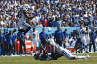 Indianapolis Colts cornerback Kenny Moore II (23) intercepts a pass intended for Tennessee Titans wide receiver Chester Rogers, on the ground, in the first half of an NFL football game Sunday, Sept. 26, 2021, in Nashville, Tenn. (AP Photo/Wade Payne)