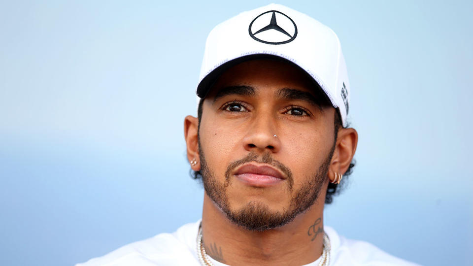 Lewis Hamilton looking forward in Mercedes gear.