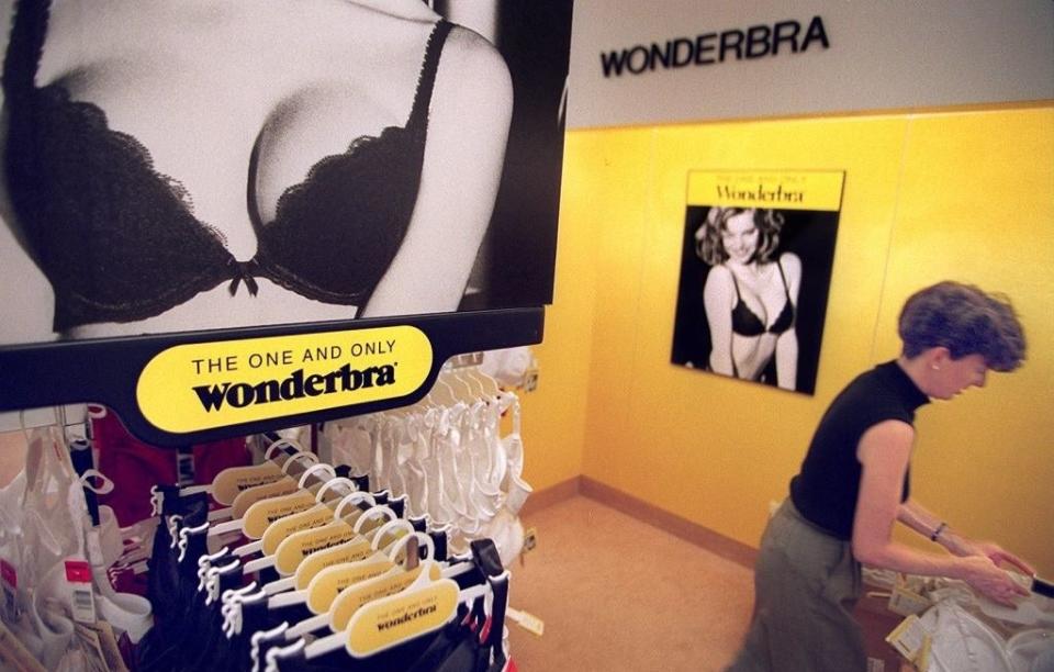 Store with a large ad for "The One and Only Wonderbra" and bras on display