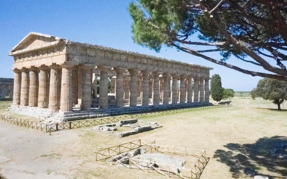 Ahead of the Colosseum and Pompeii, the towering Greek temple complex at Paestum near Naples was the first Italian archaeological site to reopen to tourists after the lockdown - Getty