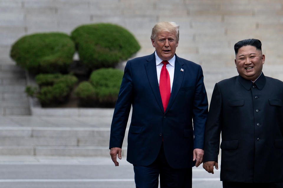 US President Donald Trump and North Korea's leader Kim Jong-un walk on North Korean soil toward South Korea in the Demilitarized Zone (DMZ) in Panmunjom on 30 June 2019. (Photo: AFP/Getty Images)