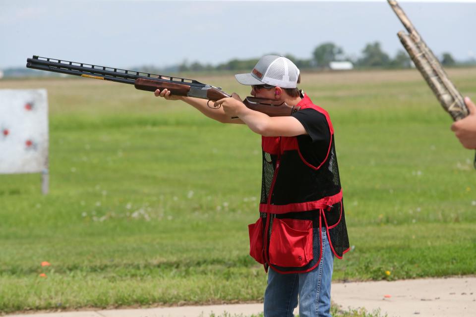 Chamberlain's Chevy Fees shoots at a clay target during the South Dakota High School Clay Target League State Tournament Friday at the Aberdeen Gun Club.