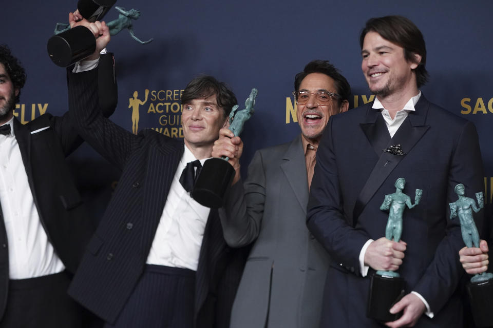 Cillian Murphy, from left, Robert Downey Jr., and Josh Hartnett, winners of the award for the award for outstanding performance by a cast in a motion picture for "Oppenheimer," pose in the press room during the 30th annual Screen Actors Guild Awards on Saturday, Feb. 24, 2024, at the Shrine Auditorium in Los Angeles. (Photo by Jordan Strauss/Invision/AP)