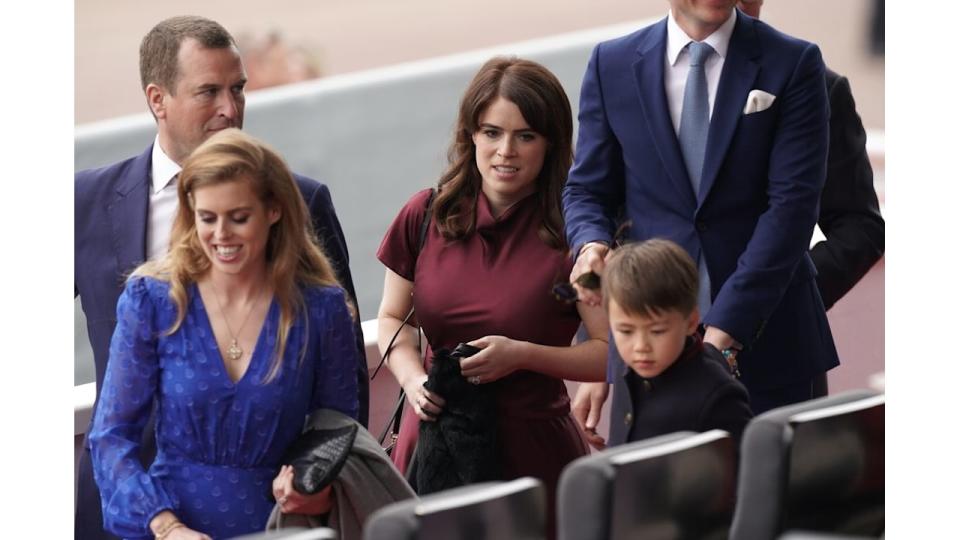 Wolfie with Eugenie and Beatrice and Peter Phillips at the Platinum Pageant 