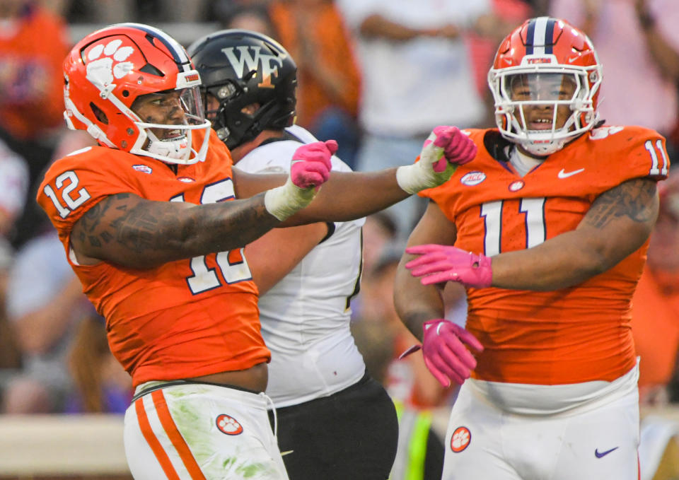 Oct 7, 2023; Clemson, South Carolina, USA; Clemson Tigers defensive lineman T.J. Parker (12) reacts after sacking Wake Forest Demon Deacons quarterback Mitch Griffis (not pictured) during the fourth quarter at Memorial Stadium. Mandatory Credit: Ken Ruinard-USA TODAY Sports