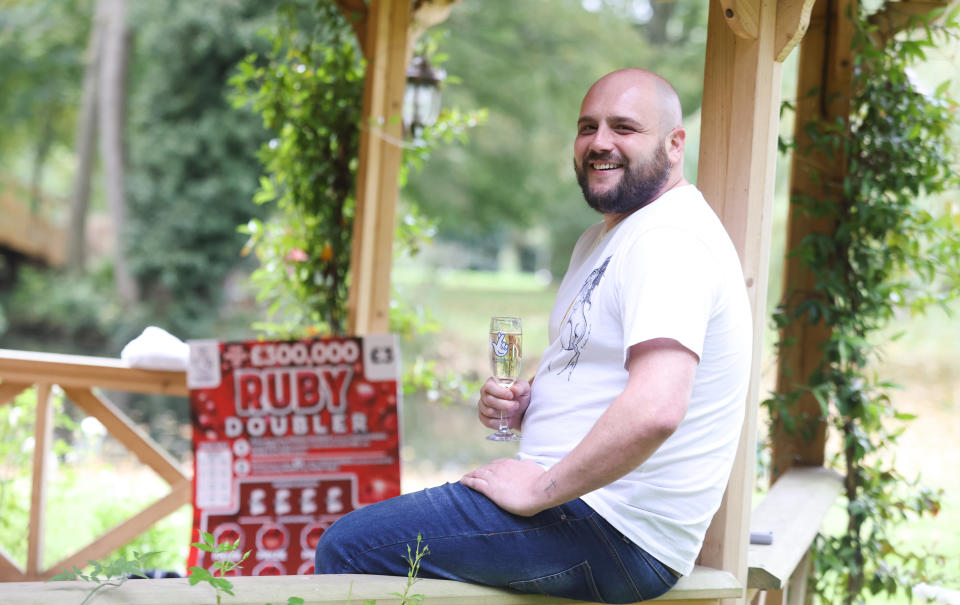 Plumber Sean Irwin, 36, is to retrain as a videographer after a £300,000 Lottery scratch card win. (National Lottery/ PA)